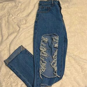 Distressed high rise jeans